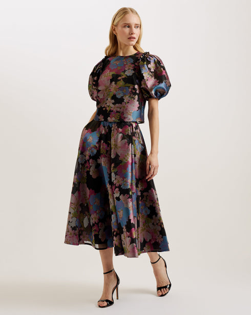BURSA-Skirts-A bold jacquard floral design makes BURSA the ultimate statement skirt. Fitted at the waist and flaring out in an A-line silhouette, this midi skirt will bring fun and flounce to your looks every season. Keep it simple for spring with a plain t-shirt, or edge it up for winter with leather accessories. Midi skirt Jacquard floral design A-line silhouette Swing style Fitted waist Front pockets Hidden zip fastening- Ted Baker Romania